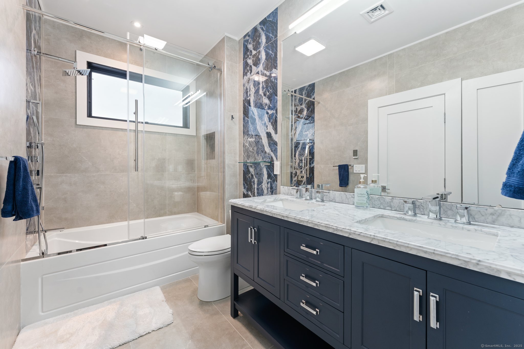 Undisclosed Address Norwich, CT 06360 - Photo 23 of 40 a bathroom with a granite countertop sink toilet and shower