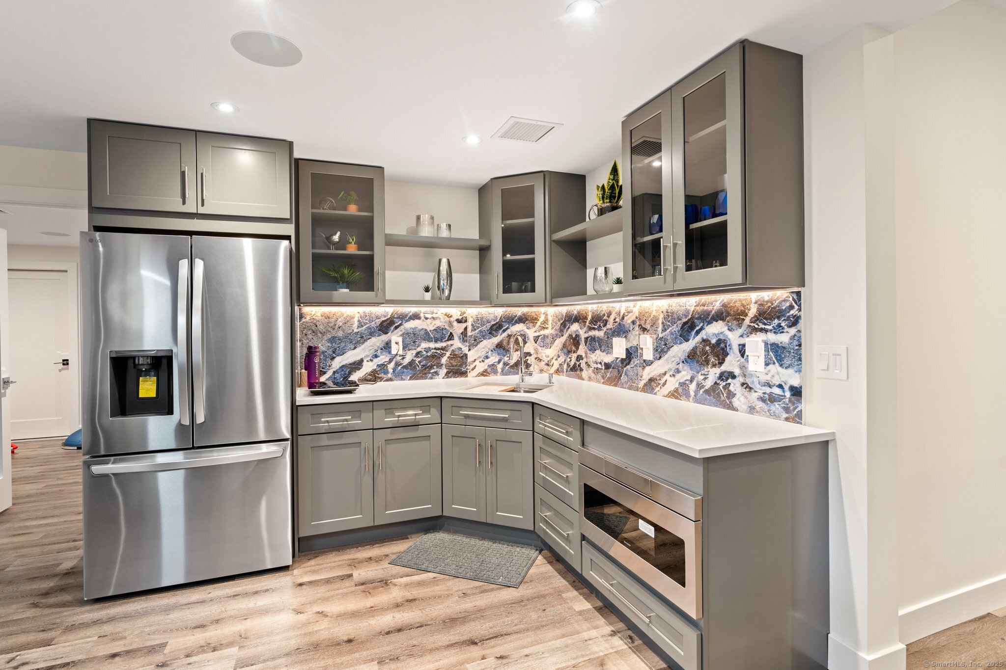 Undisclosed Address Norwich, CT 06360 - Photo 27 of 40 a kitchen with stainless steel appliances granite countertop a refrigerator and a sink