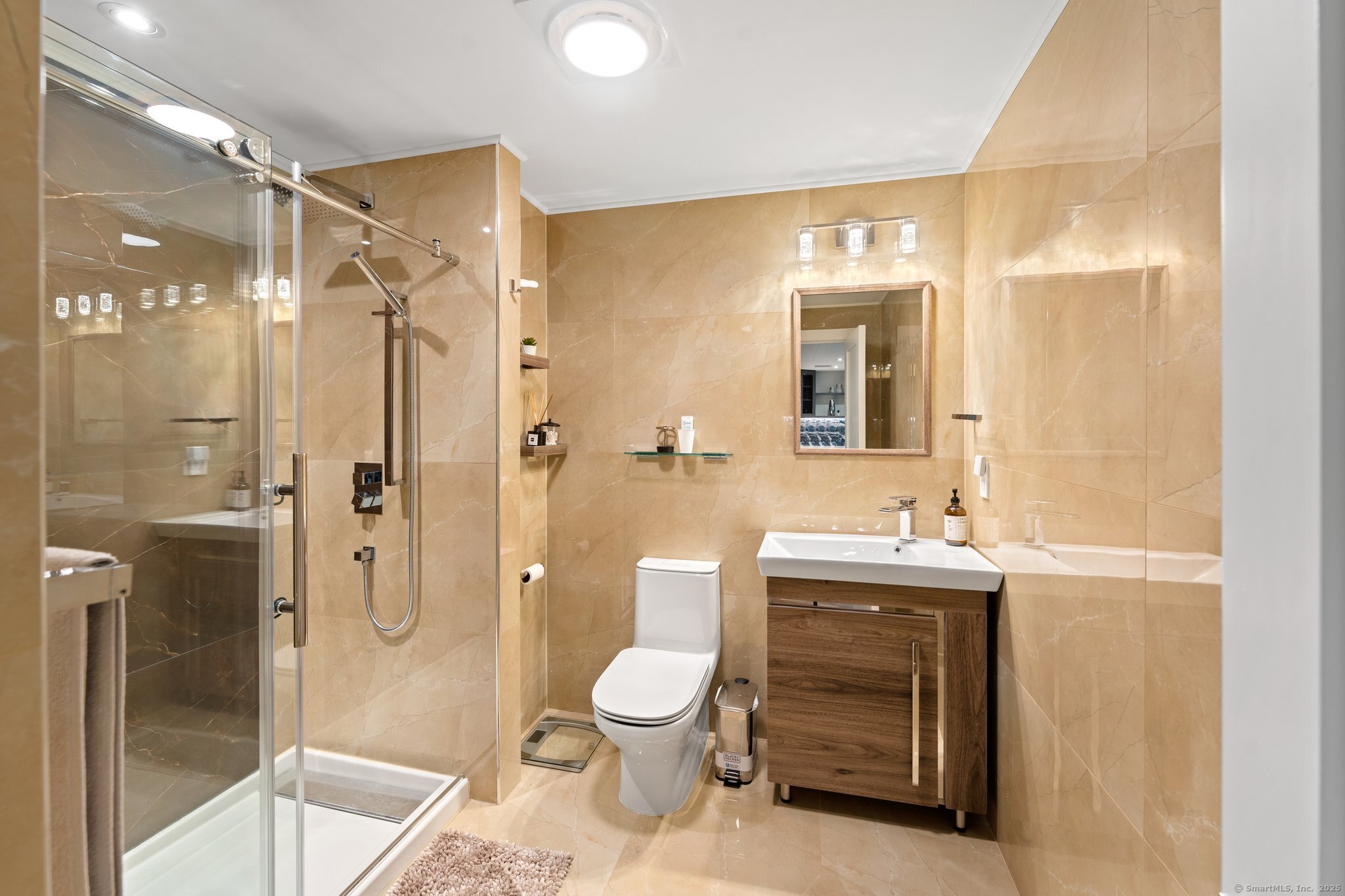 Undisclosed Address Norwich, CT 06360 - Photo 29 of 40 a bathroom with a toilet a sink and shower