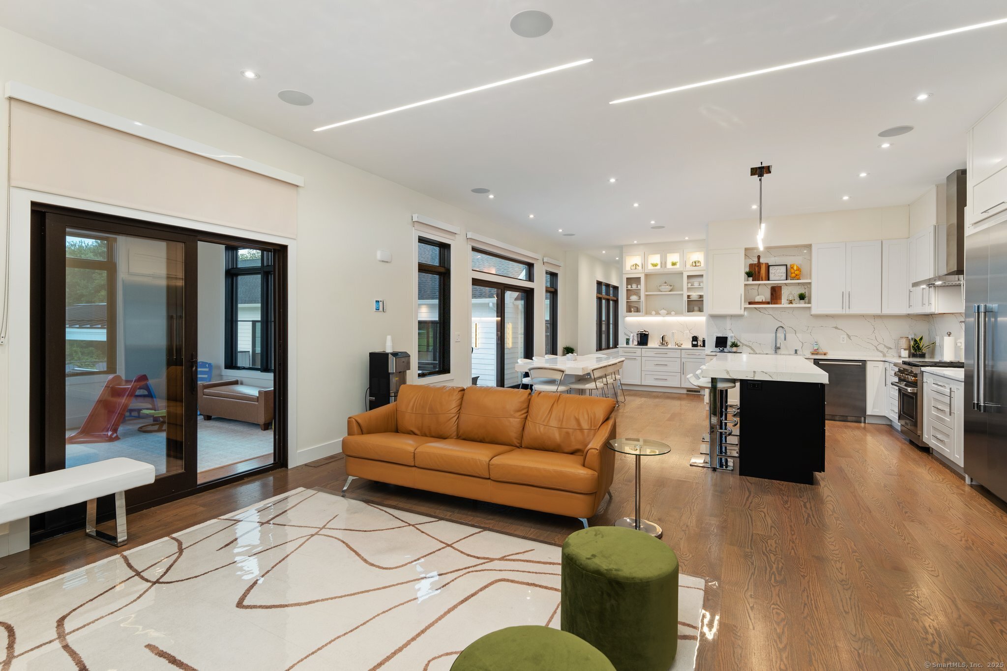 Undisclosed Address Norwich, CT 06360 - Photo 36 of 40 a living room with furniture and kitchen view