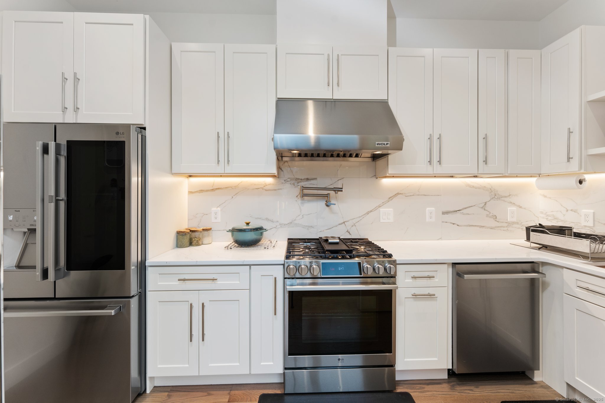 Undisclosed Address Norwich, CT 06360 - Photo 5 of 40 a kitchen with stainless steel appliances a stove a sink and a refrigerator