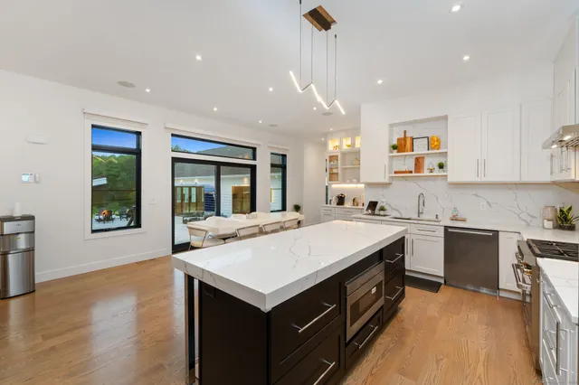 a kitchen with a stove and a sink