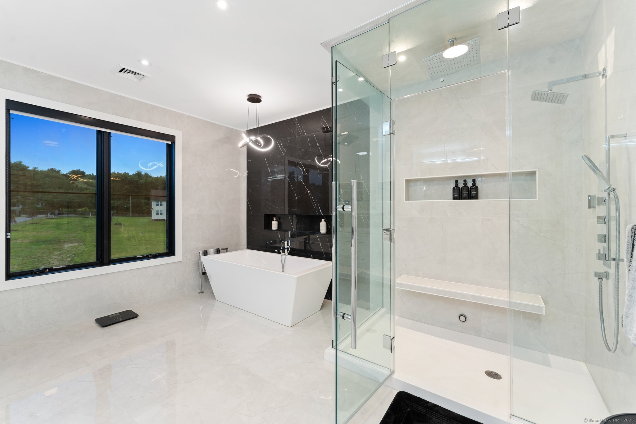 Undisclosed Address Norwich, CT 06360 - Photo 9 of 40 a bathroom with a tub shower and sink