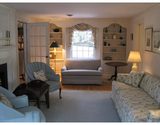 25 Audubon Road Wellesley, MA 02481 - Photo 2 of 15 a living room with furniture and a large window