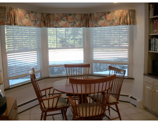 25 Audubon Road Wellesley, MA 02481 - Photo 7 of 15 a view of a chairs and table in the balcony