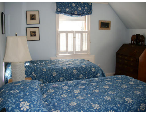 25 Audubon Road Wellesley, MA 02481 - Photo 10 of 15 a bedroom with a bed and a window