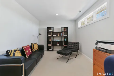 a living room with furniture and a couch