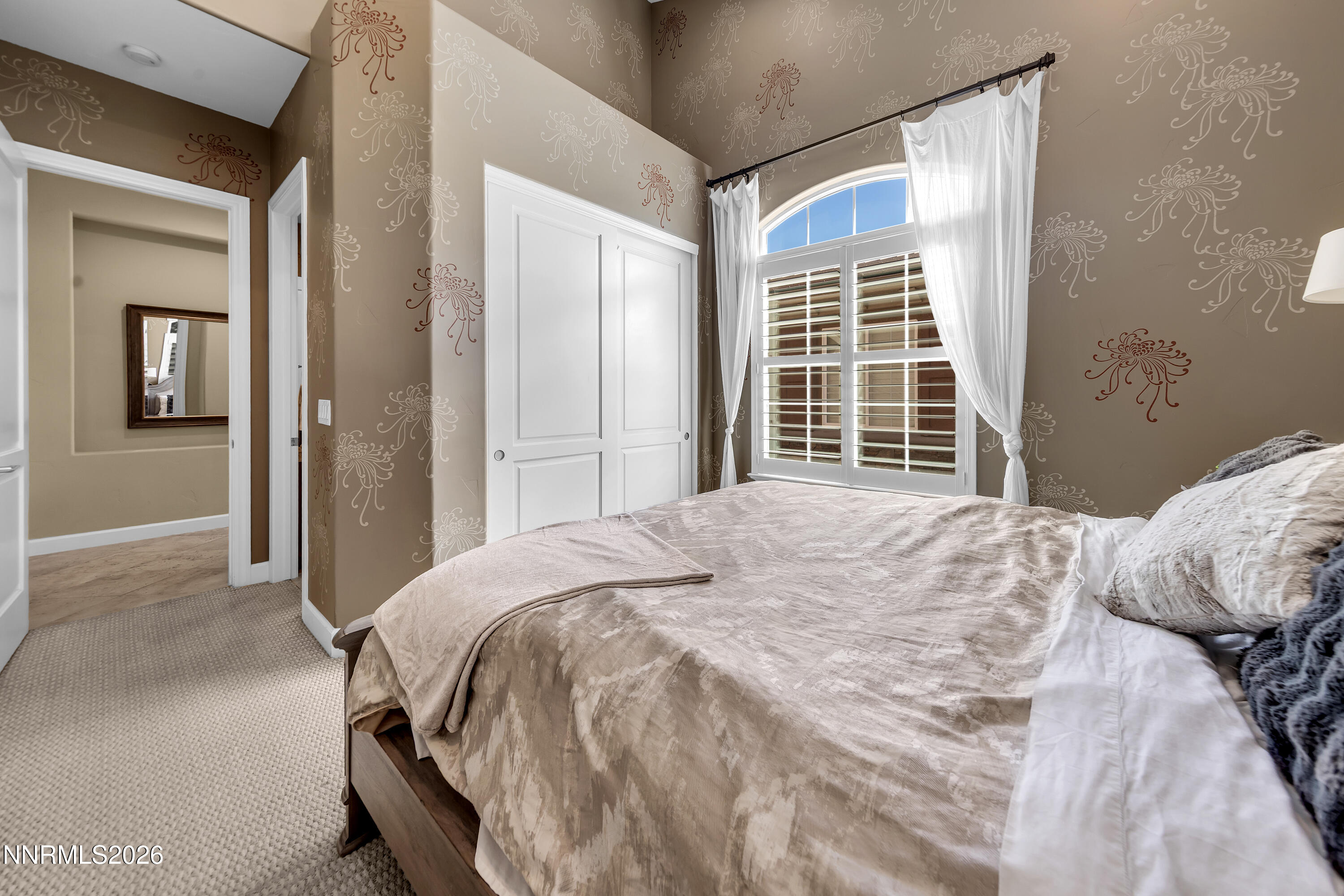 1898 Laurel Ridge Drive Reno, NV 89523 - Photo 46 of 87 a bedroom with a bed and a large window