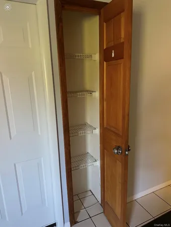 a bathroom with a glass door shower