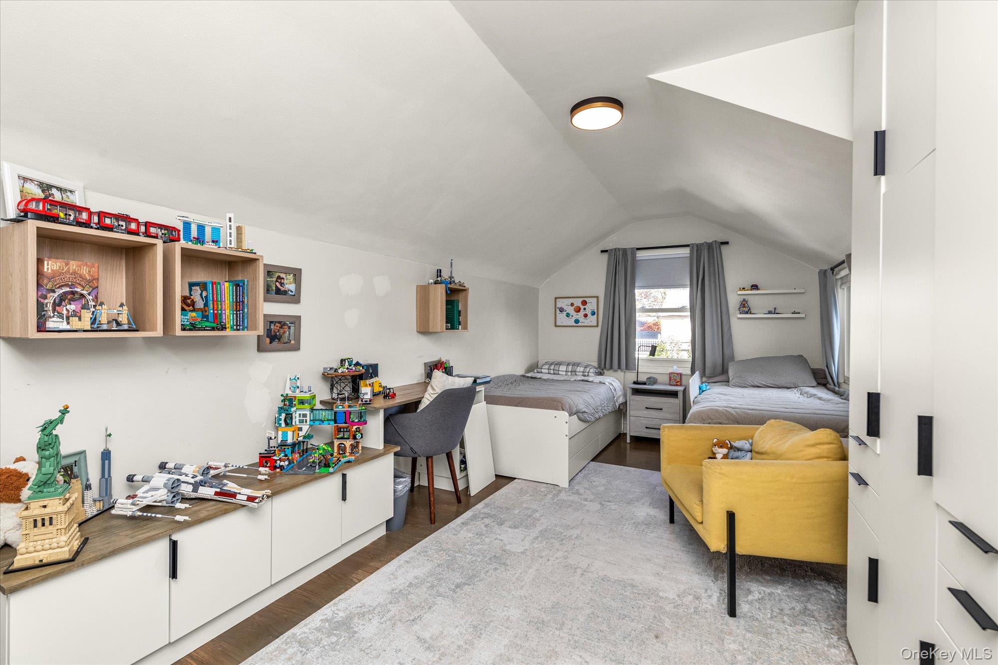 13 Gotham Street Valley Stream, NY 11581 - Photo 12 of 22 a room with furniture and a wooden floor