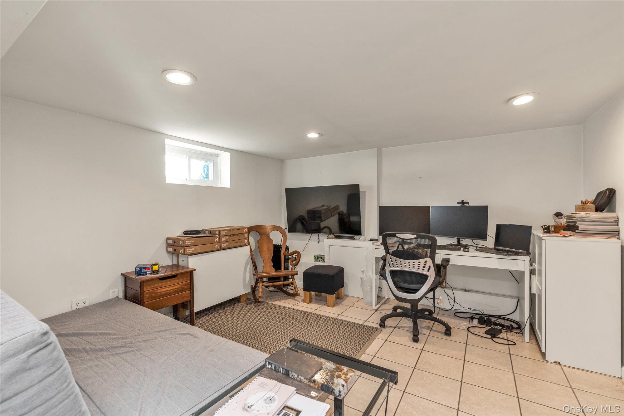 13 Gotham Street Valley Stream, NY 11581 - Photo 14 of 22 a living room with furniture and a flat screen tv