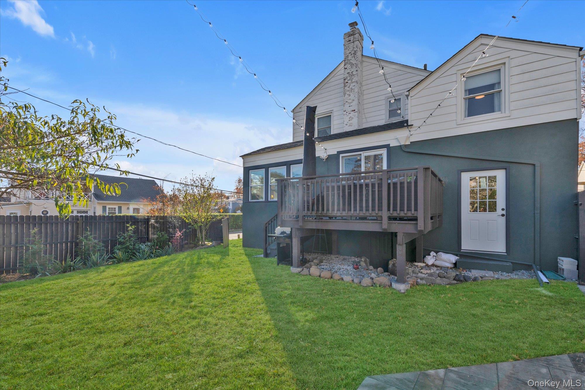 13 Gotham Street Valley Stream, NY 11581 - Photo 18 of 22 a front view of a house with garden