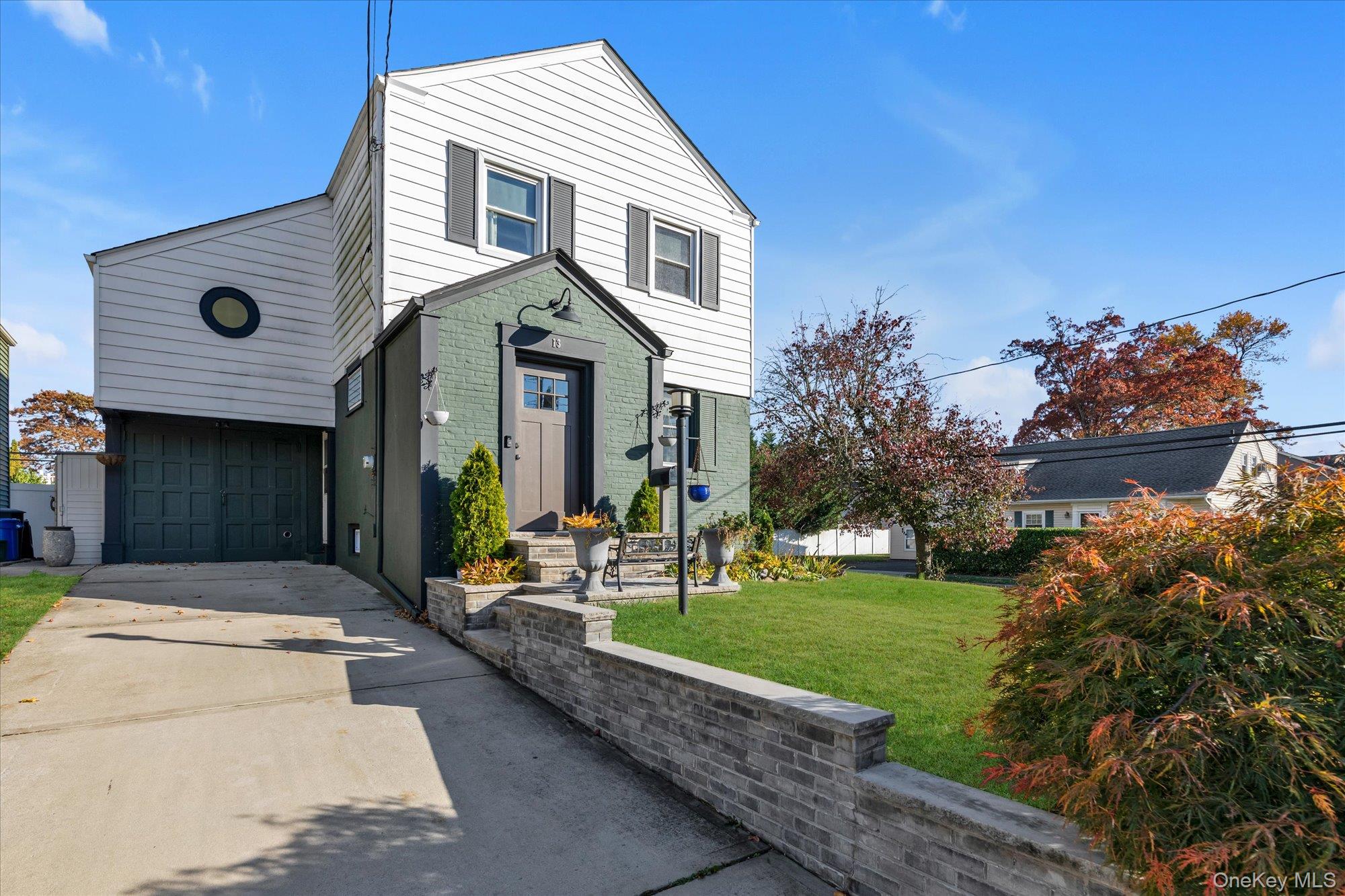 13 Gotham Street Valley Stream, NY 11581 - Photo 21 of 22 a front view of a house with a yard