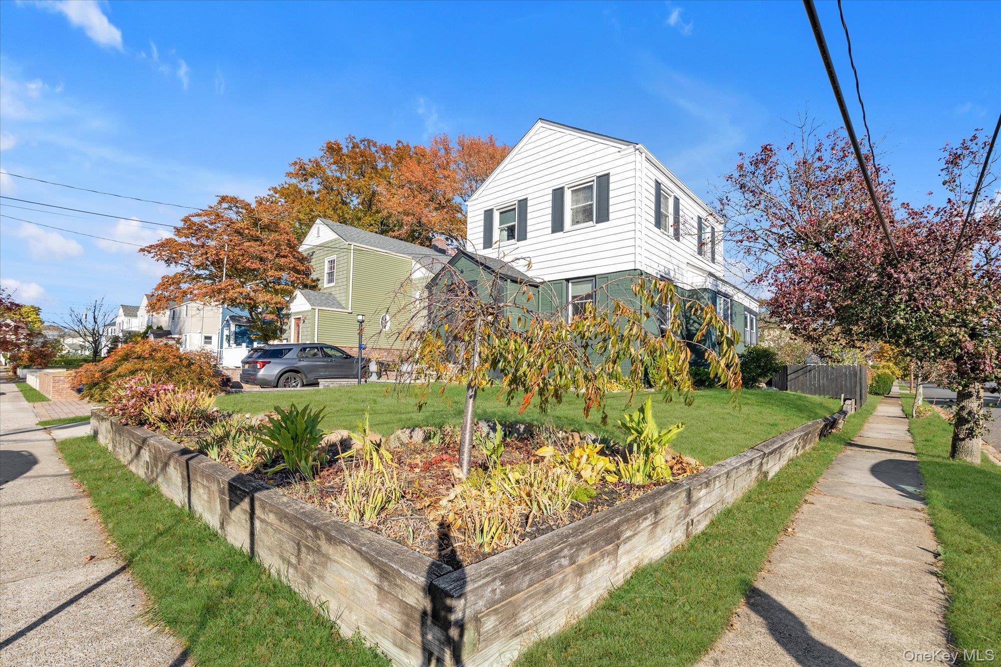 13 Gotham Street Valley Stream, NY 11581 - Photo 22 of 22 a front view of a house with a yard