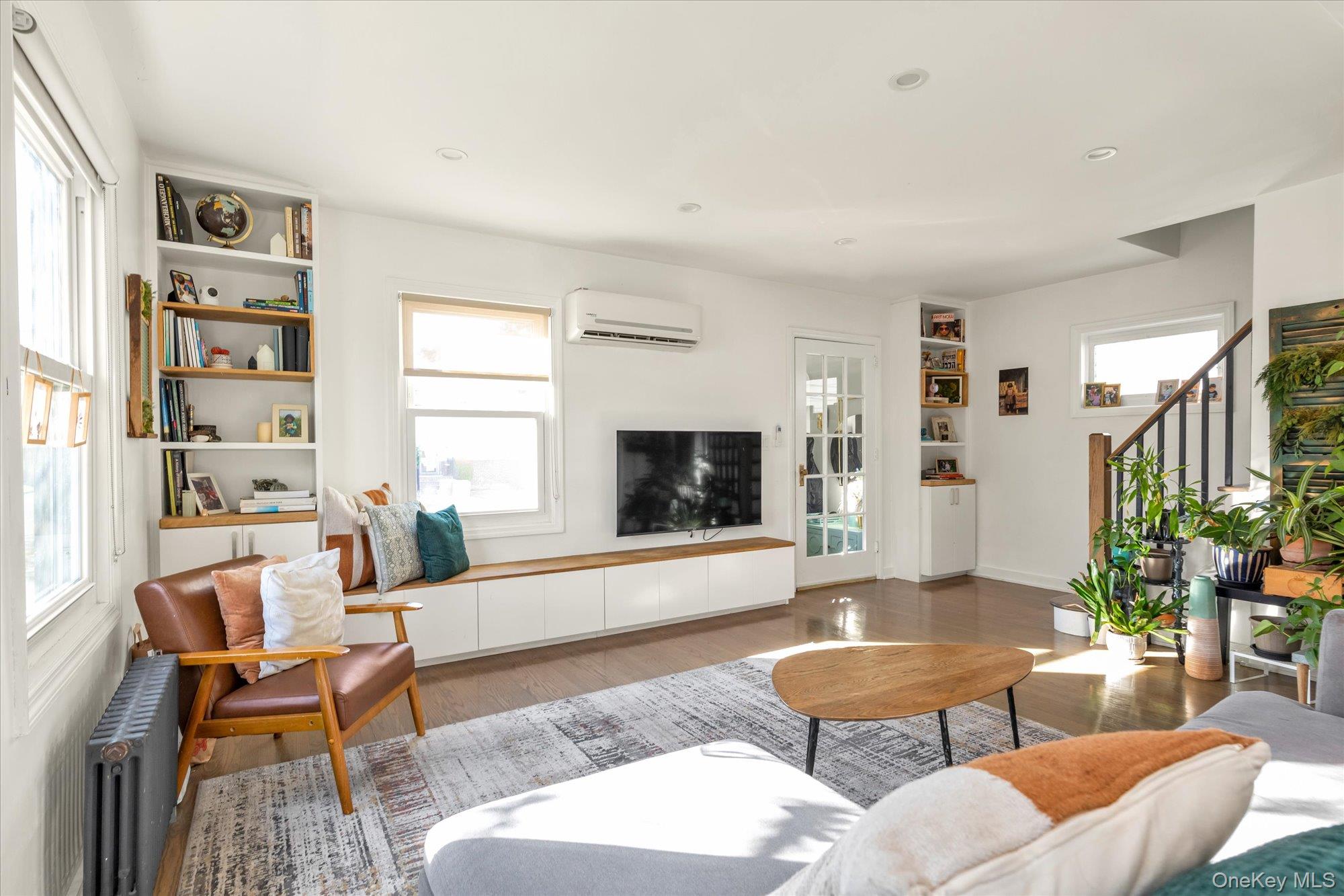 13 Gotham Street Valley Stream, NY 11581 - Photo 4 of 22 a living room with furniture and a flat screen tv