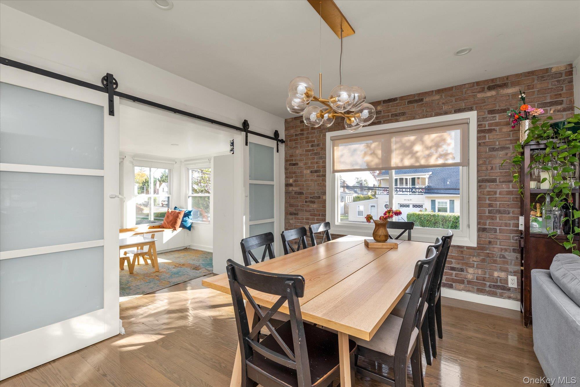 13 Gotham Street Valley Stream, NY 11581 - Photo 5 of 22 a view of a dining room with furniture window and outside view