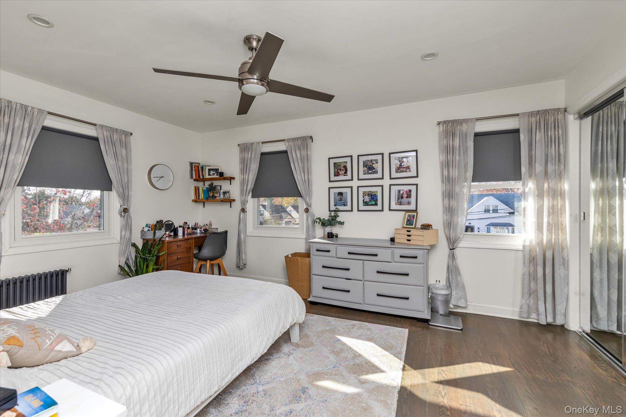 13 Gotham Street Valley Stream, NY 11581 - Photo 10 of 22 a bed room with a bed and a dresser