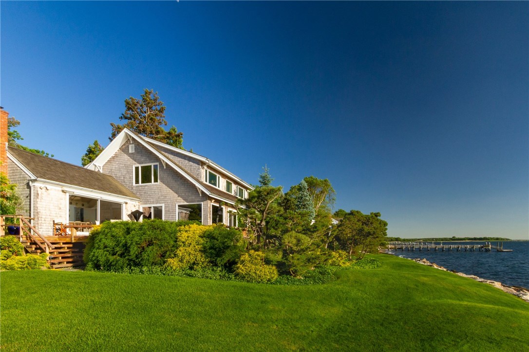 79 Shore Road Bristol, RI 02809 - Photo 21 of 47 The Guest House -A sweeping lawn cascades down to the private shoreline