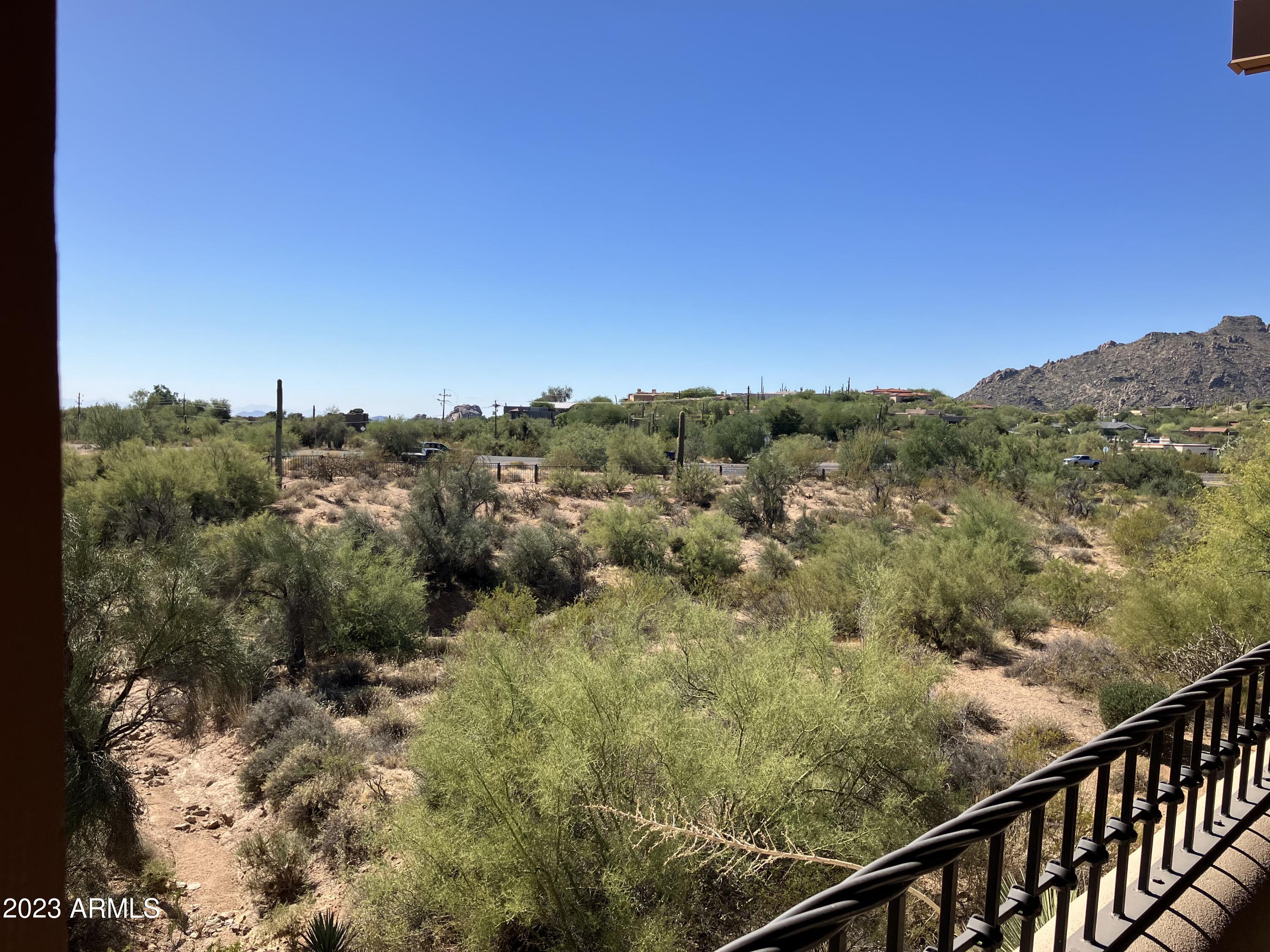 36601 North Mule Train Road, Unit 29C Carefree, AZ 85377 - Photo 18 of 35 a view of a city with lush green forest