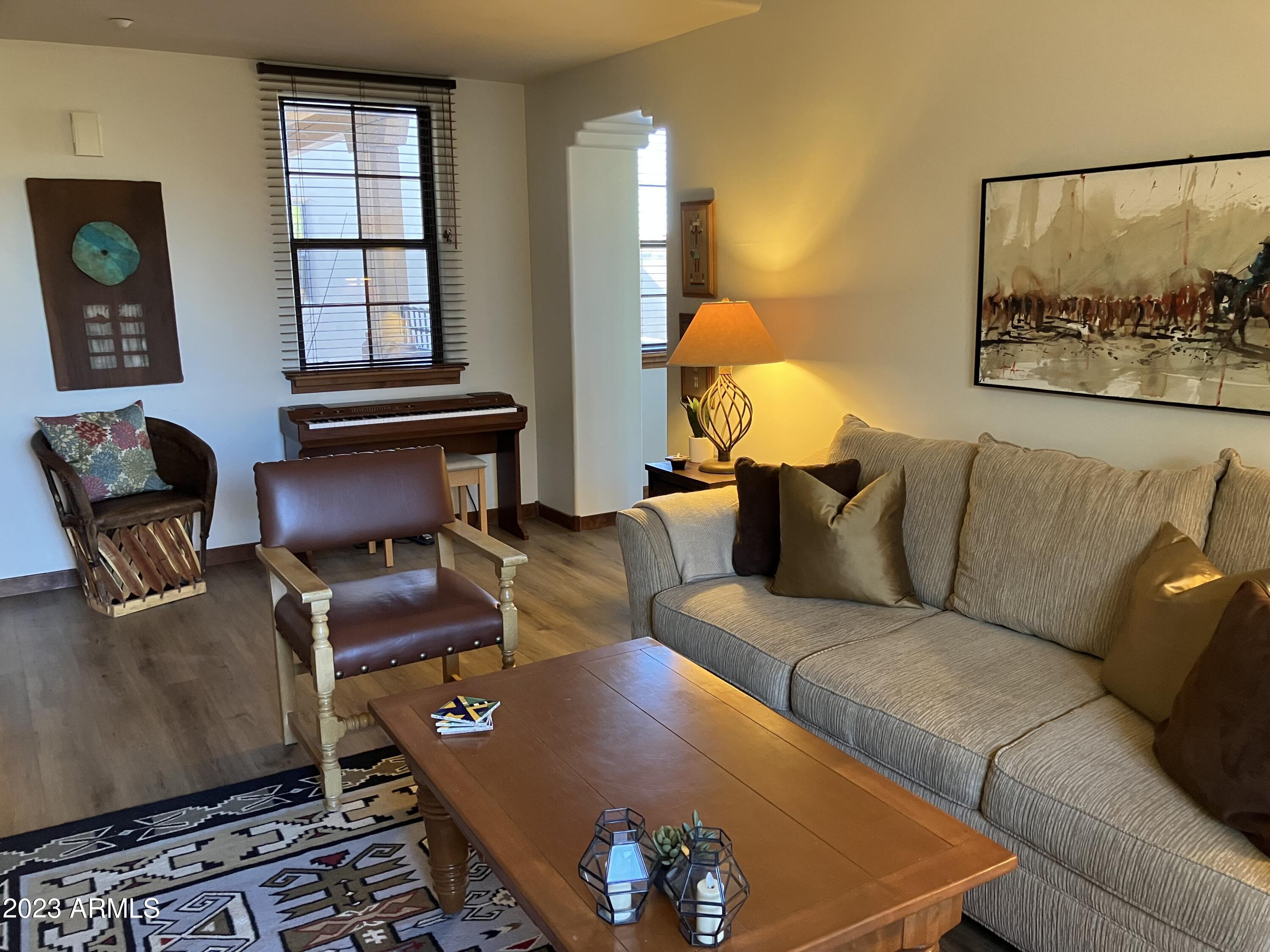 36601 North Mule Train Road, Unit 29C Carefree, AZ 85377 - Photo 21 of 35 a living room with furniture and a window