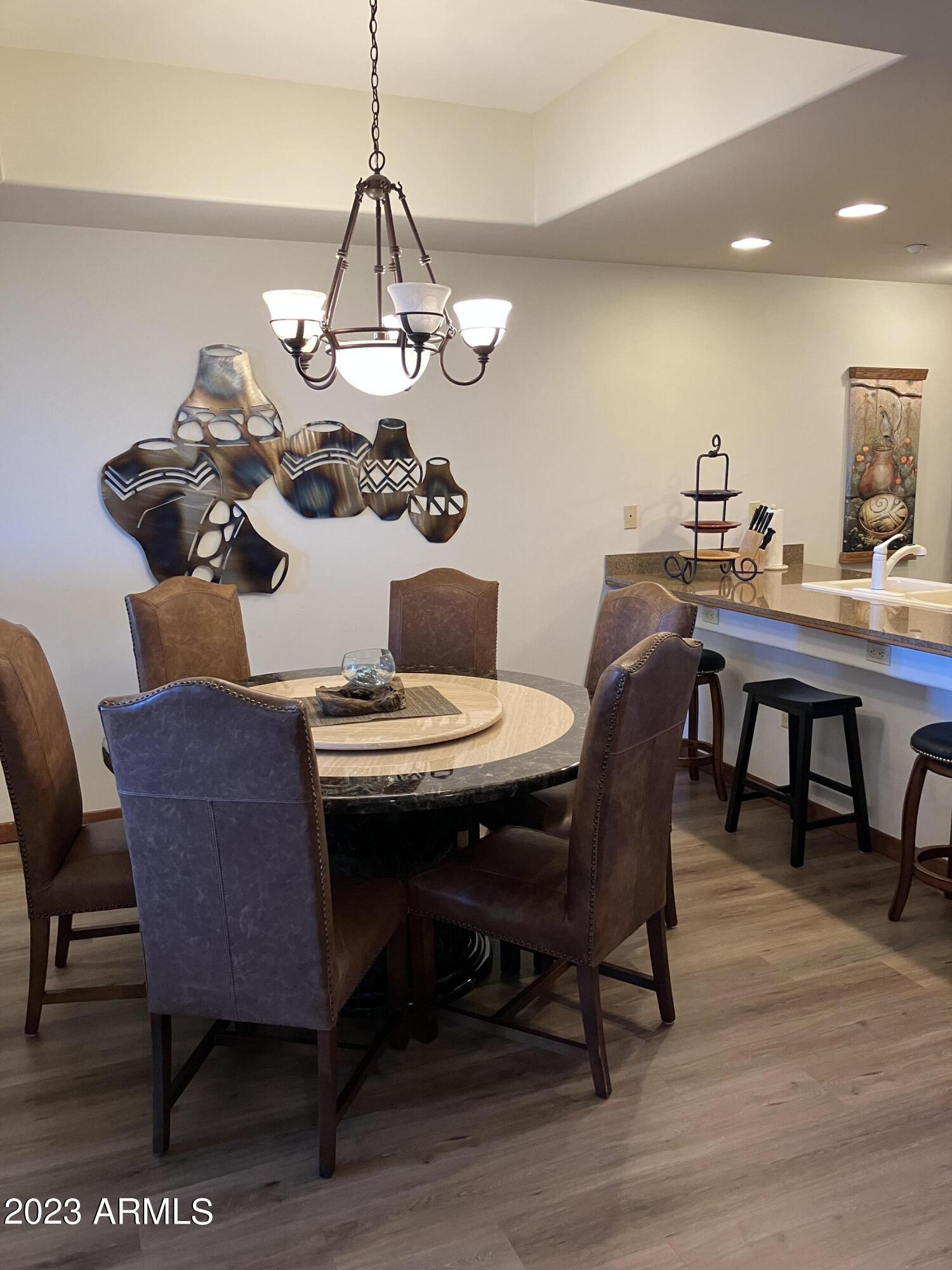 36601 North Mule Train Road, Unit 29C Carefree, AZ 85377 - Photo 5 of 35 a view of a dining room with furniture