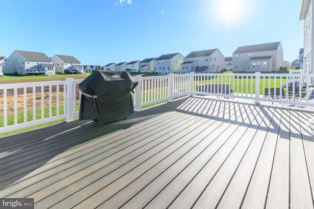 an aerial view of a house with outdoor space swimming pool and ocean view