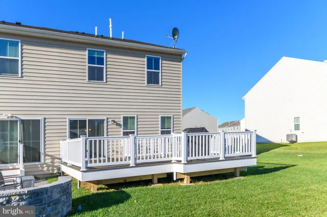 aerial view of a house with a swimming pool