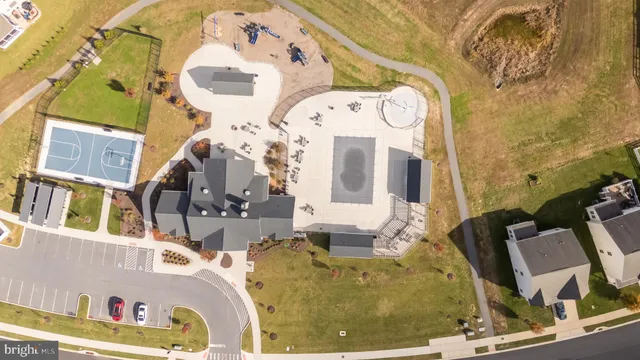 a view of a swimming pool with a table and chairs