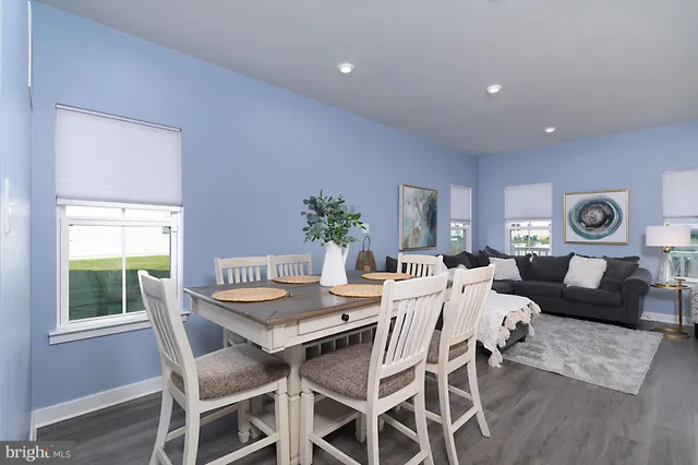 a spacious bedroom with a large bed and a couch