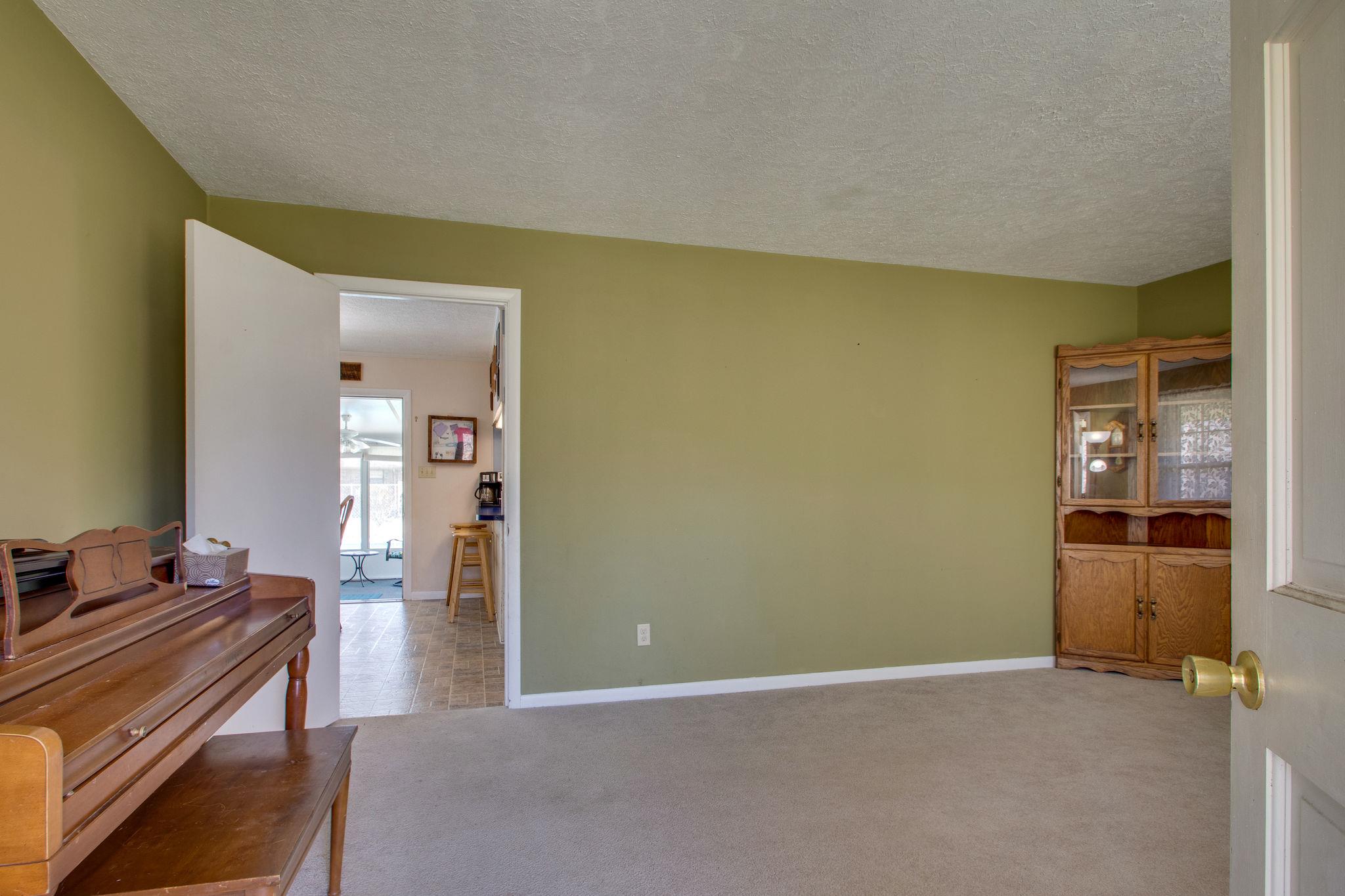 517 Ridgemont Drive Dickson, TN 37055 - Photo 12 of 27 Living Room Adjoins Kitchen/Dining Area