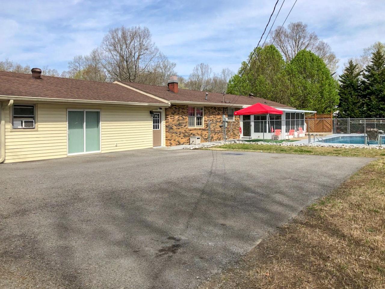 517 Ridgemont Drive Dickson, TN 37055 - Photo 24 of 27 Excellent Poolside Parking at Rear of Home * Grilling Area with Gas Connection for a Grill
