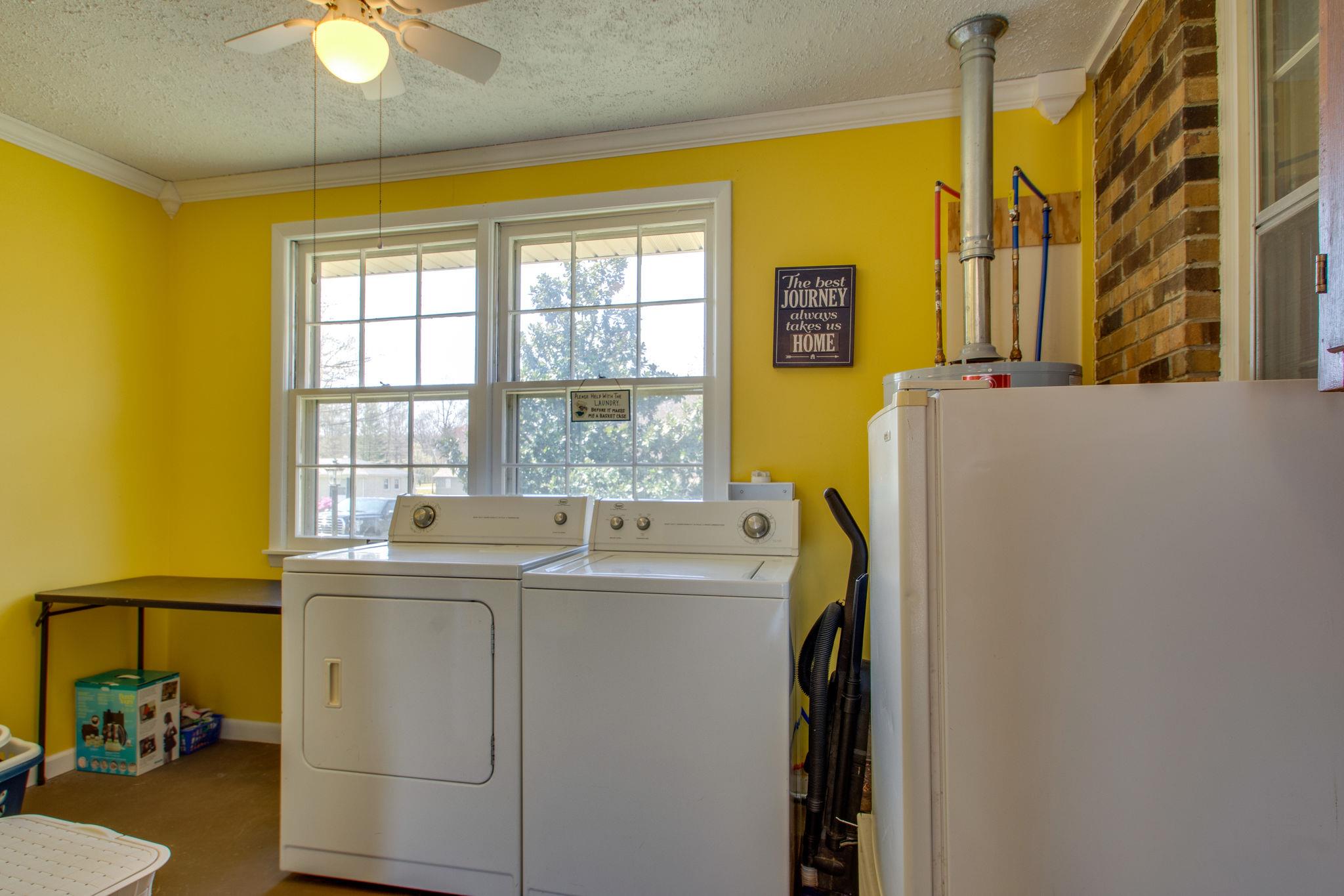 517 Ridgemont Drive Dickson, TN 37055 - Photo 6 of 27 Utility Room with Folding Area NEW Gas Water Heater 2017