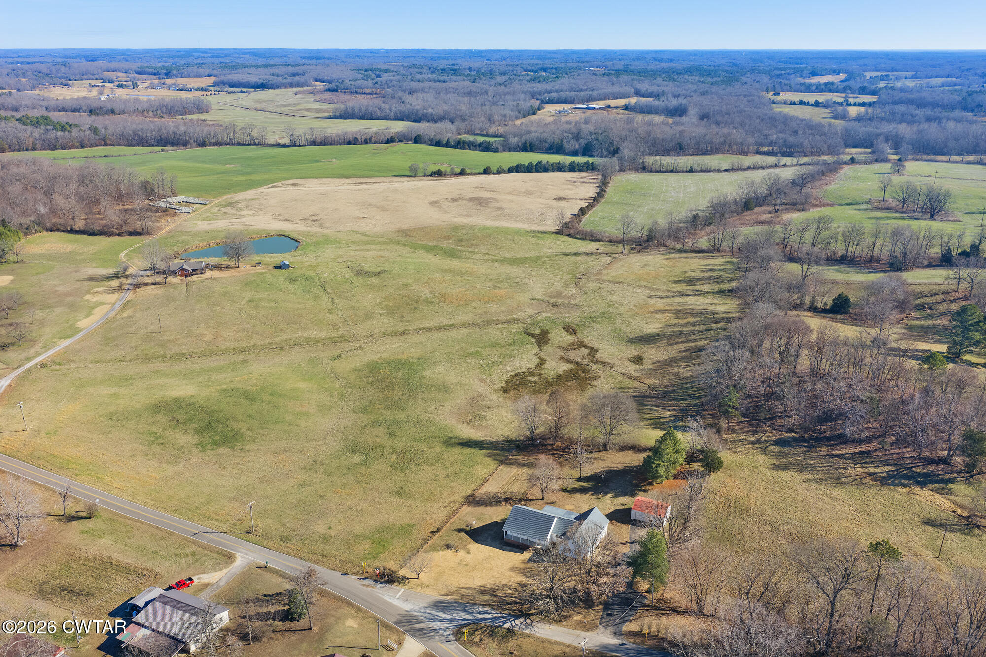 3149 Sand Ridge Road Lexington, TN 38351 - Photo 12 of 40 a view of a lake with a mountain