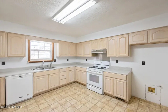 a view of a room with chandelier and living room
