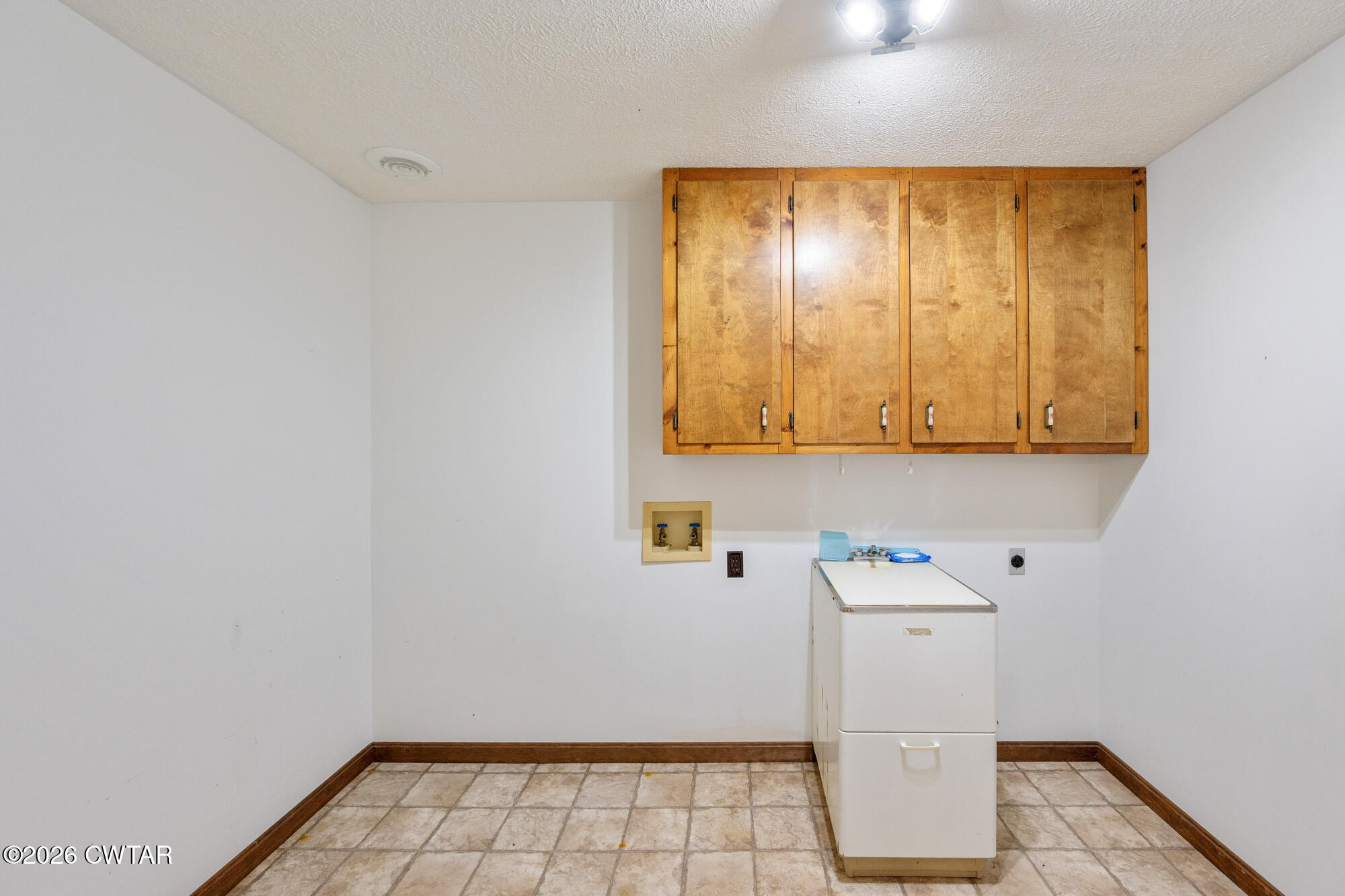 3149 Sand Ridge Road Lexington, TN 38351 - Photo 21 of 40 a room with storage and utility