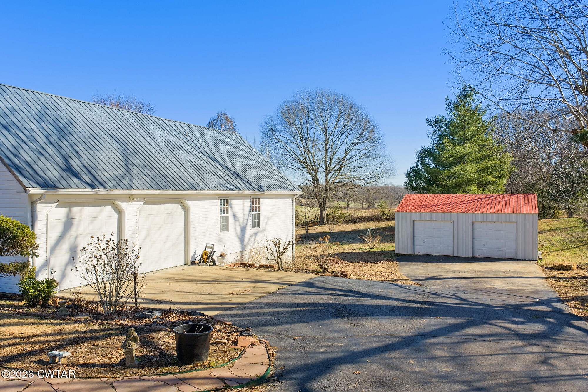 3149 Sand Ridge Road Lexington, TN 38351 - Photo 3 of 40 a view of a backyard of the house