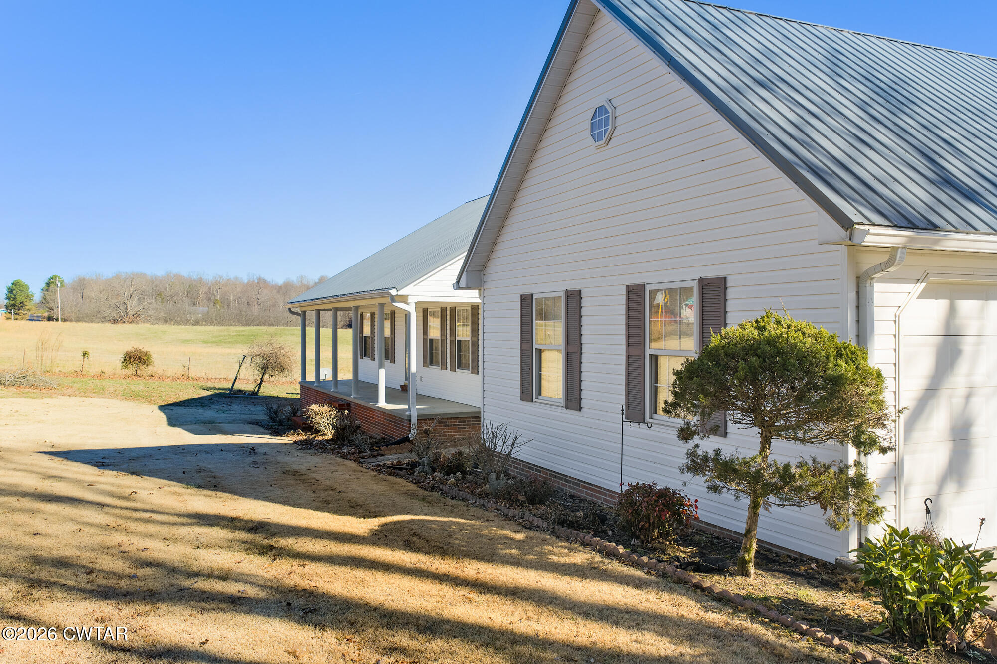 3149 Sand Ridge Road Lexington, TN 38351 - Photo 4 of 40 a view of a house with backyard and sitting area