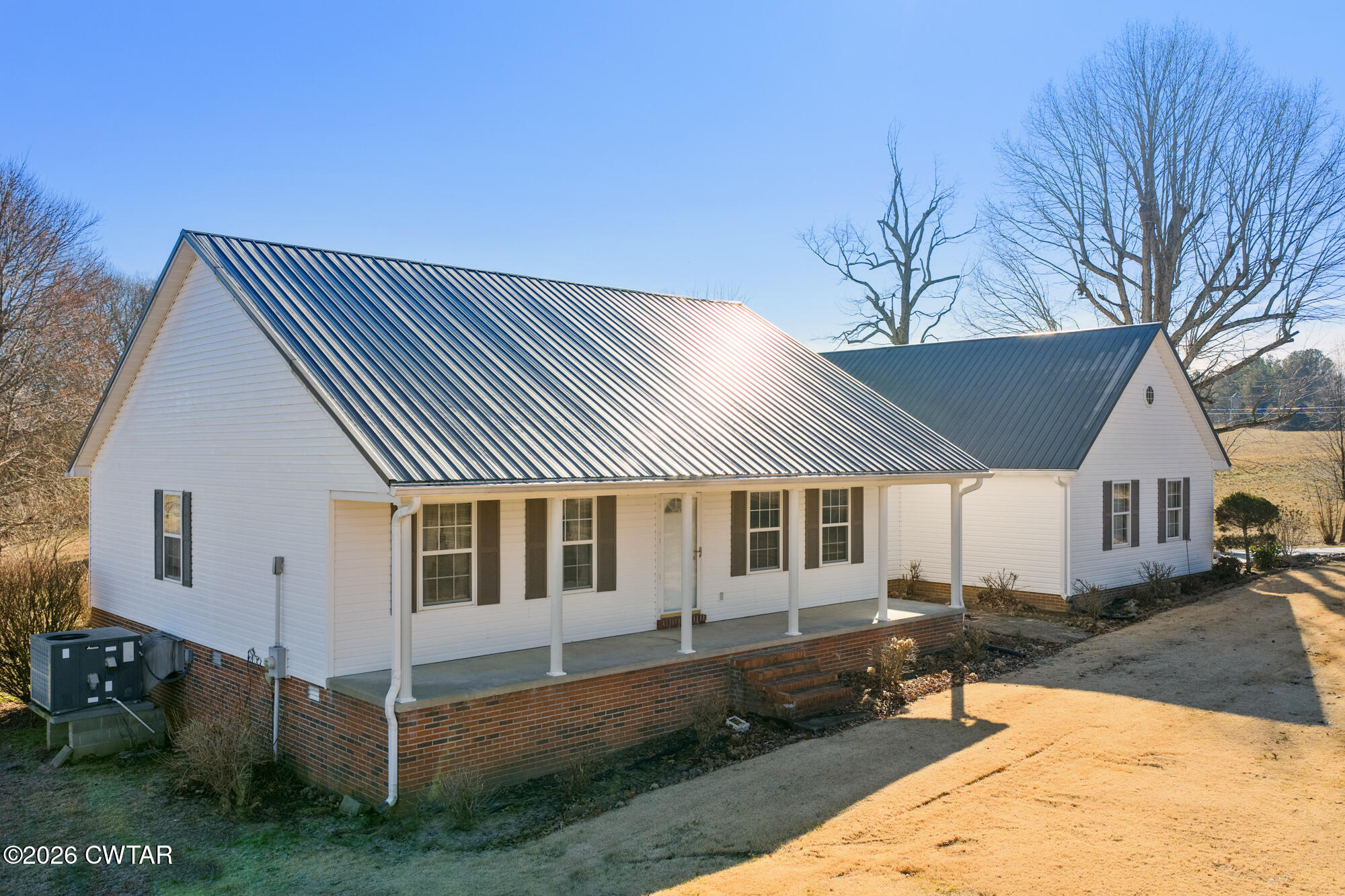 3149 Sand Ridge Road Lexington, TN 38351 - Photo 5 of 40 a view of a house with a yard