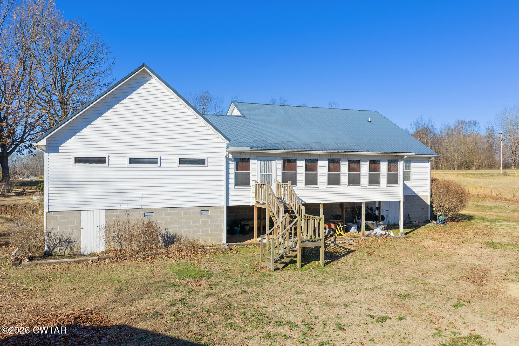 3149 Sand Ridge Road Lexington, TN 38351 - Photo 7 of 40 a view of a house with a yard and sitting area