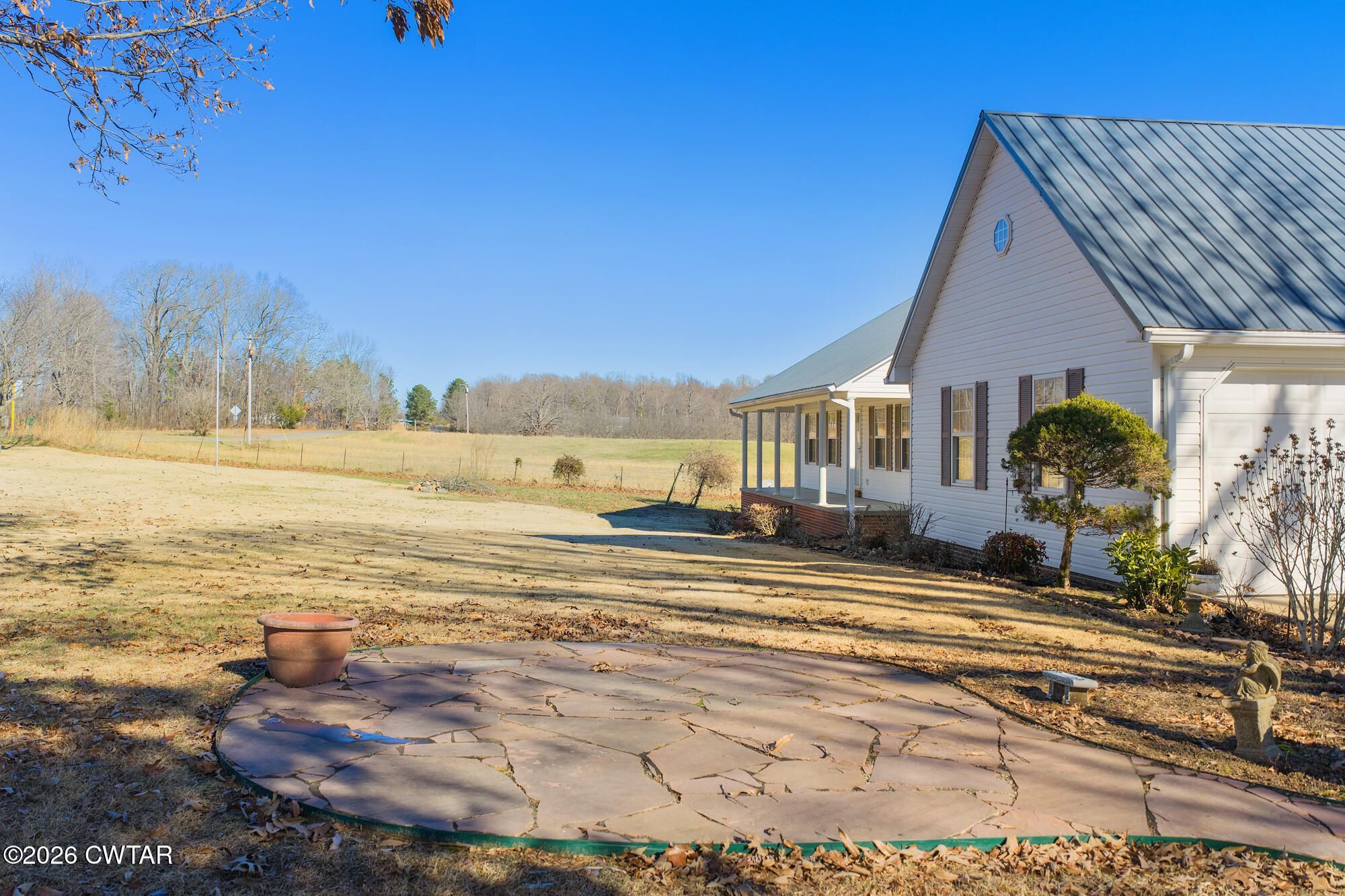 3149 Sand Ridge Road Lexington, TN 38351 - Photo 8 of 40 a view of a house with a ocean view