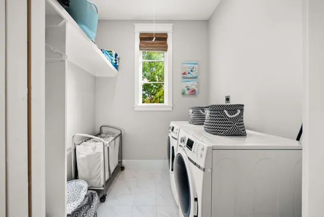 a view of a swimming pool with a lounge chair