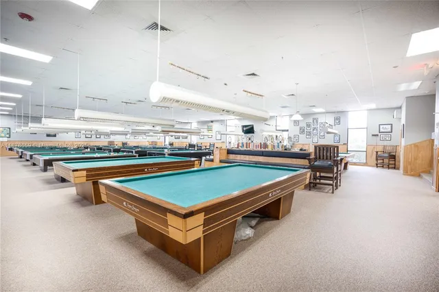 an aerial view of residential house with outdoor space and lake view