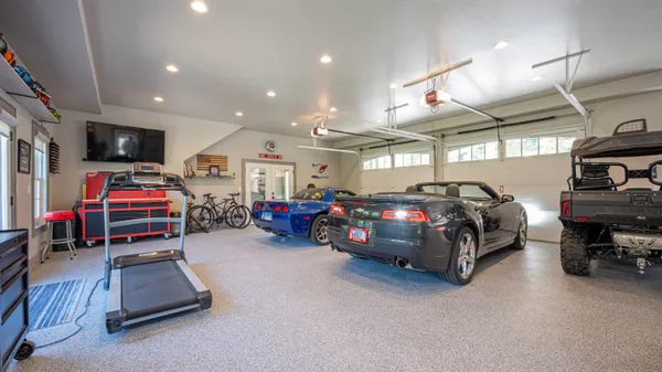 a bedroom with two beds and a window