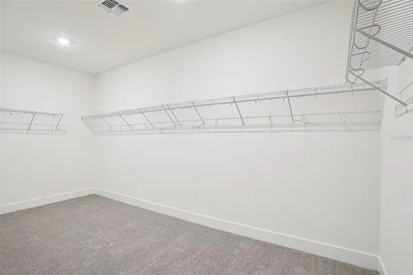 a view of a room with racks on the wall