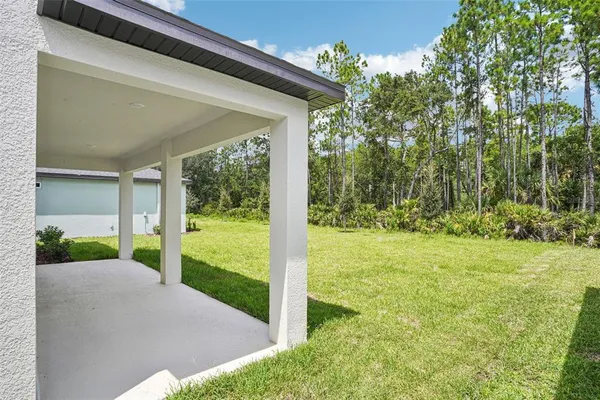 a view of a porch with a yard