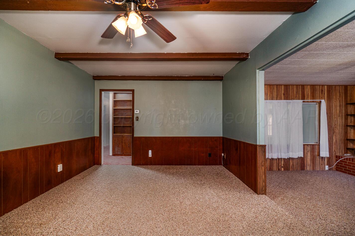 300 Mccarthy Street Borger, TX 79007 - Photo 5 of 31 a view of an empty room and window