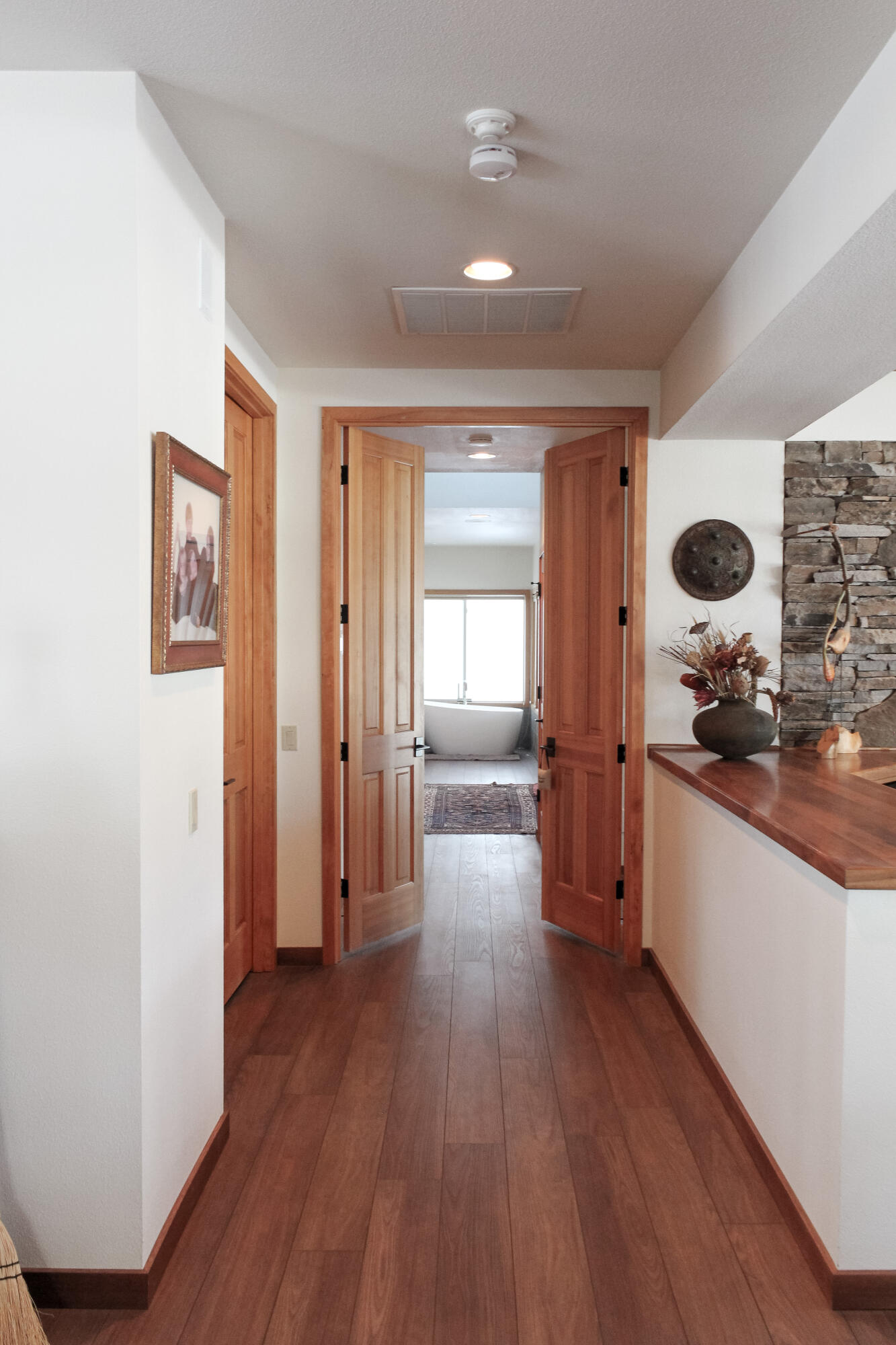 18841 Baker Road Bend, OR 97702 - Photo 26 of 60 a large space with a window and wooden floor