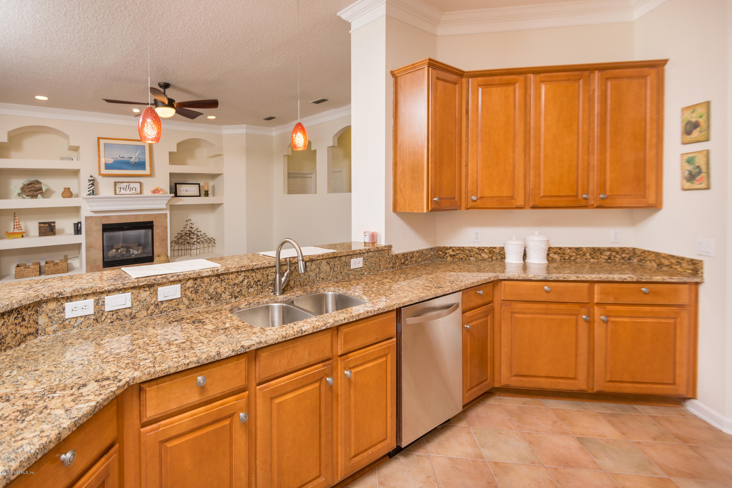 800 Riley Lane St. Augustine, FL 32095 - Photo 18 of 88 a kitchen with stainless steel appliances granite countertop a sink and cabinets