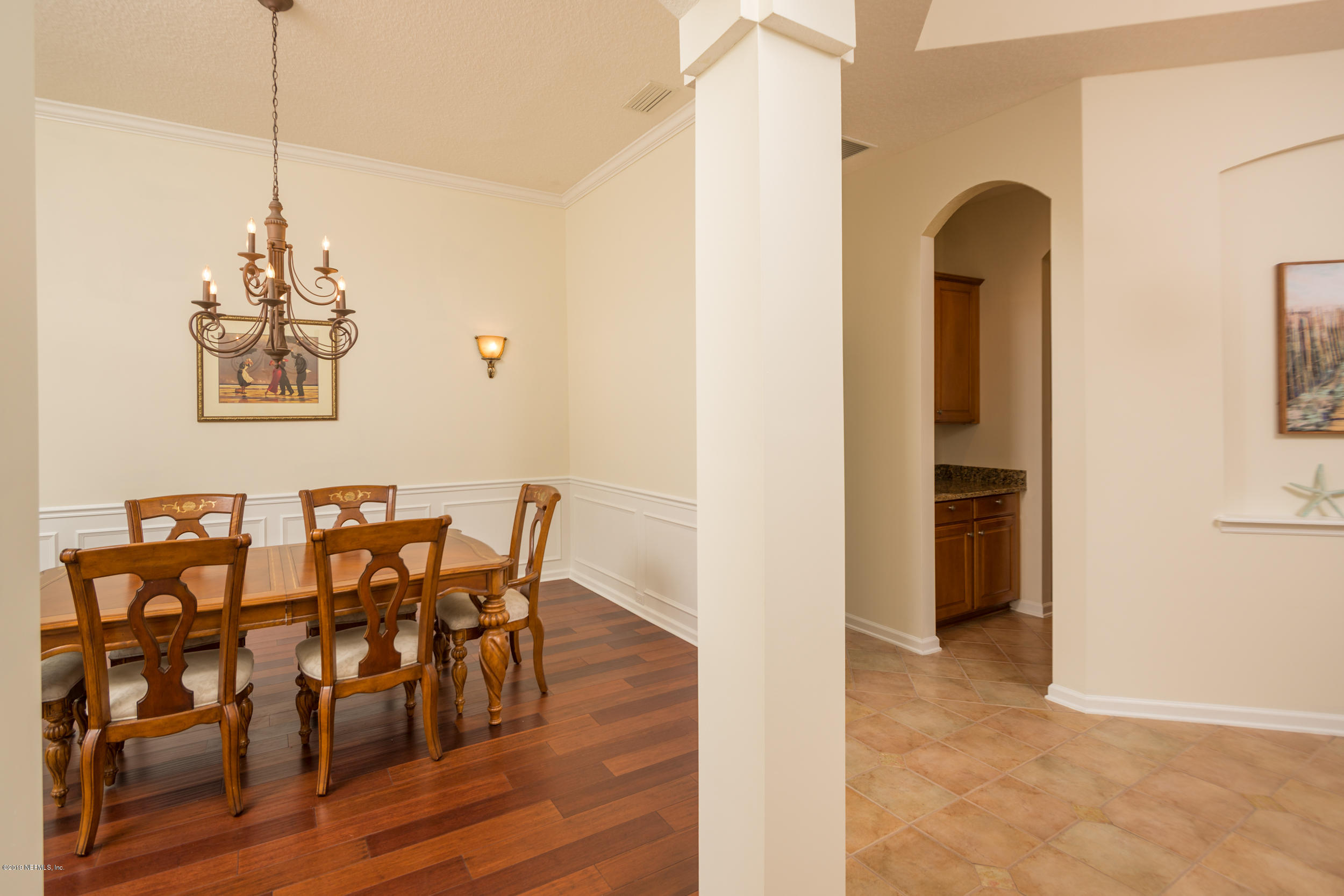 800 Riley Lane St. Augustine, FL 32095 - Photo 23 of 88 a view of a dining room with furniture and wooden floor
