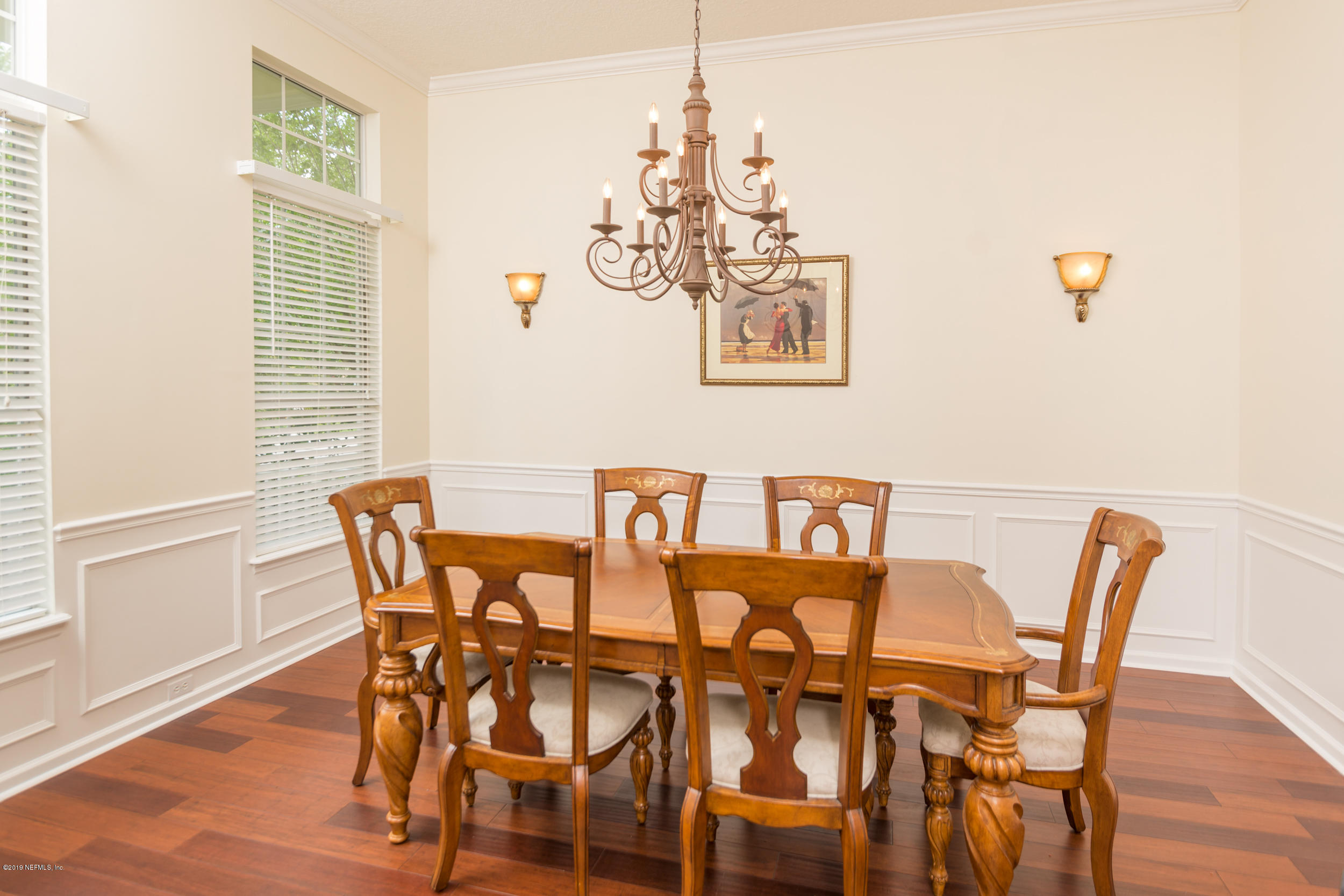 800 Riley Lane St. Augustine, FL 32095 - Photo 24 of 88 a view of a dining room with furniture and wooden floor